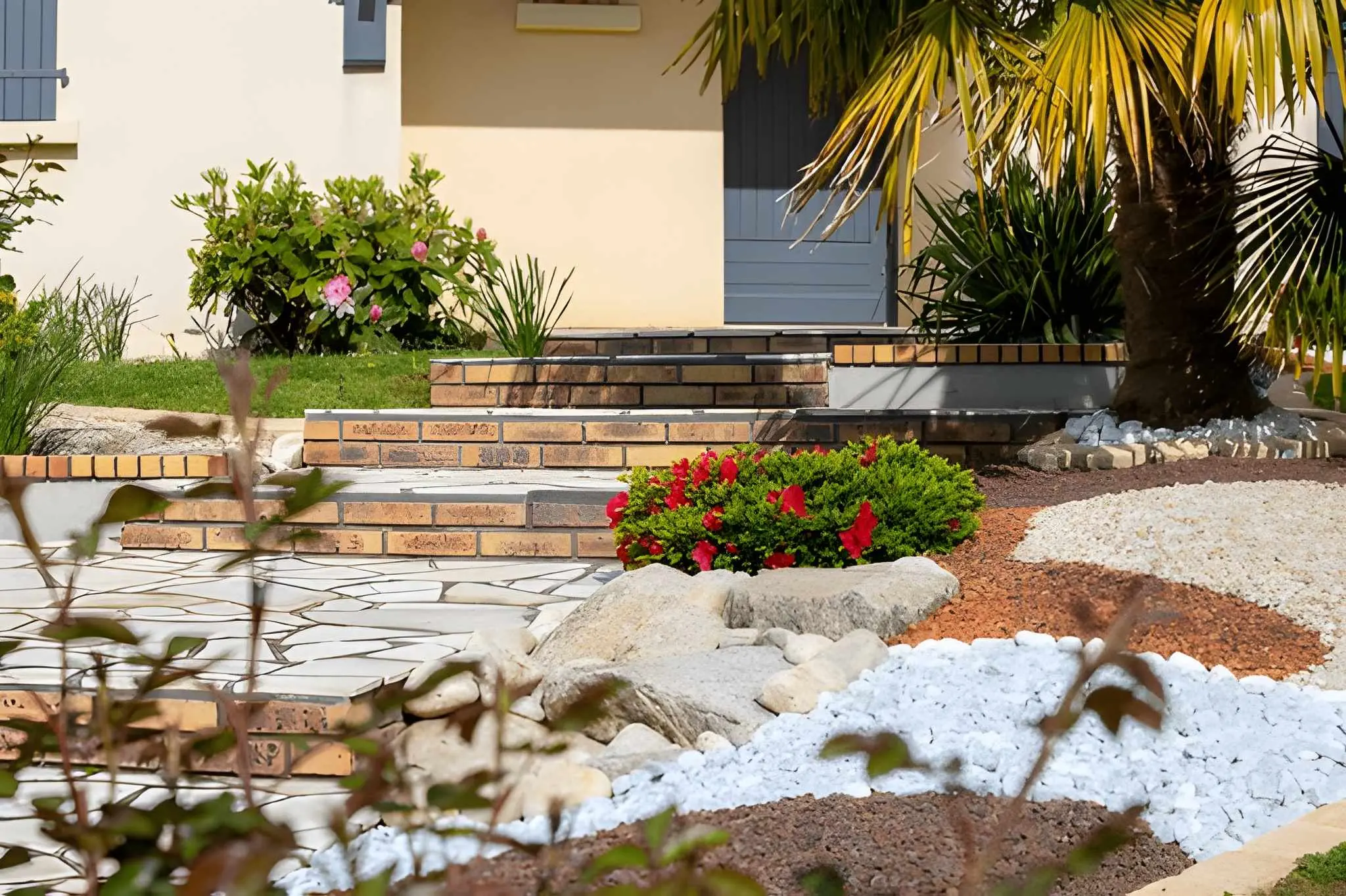 Hardscaping Henderson Curb Appeal Upgrades for Front Yard Design-4 Multi-textured stone walkway and flowerbed enhancements, designed by Sun Valley Landscaping to boost curb appeal with clean lines and natural beauty.
