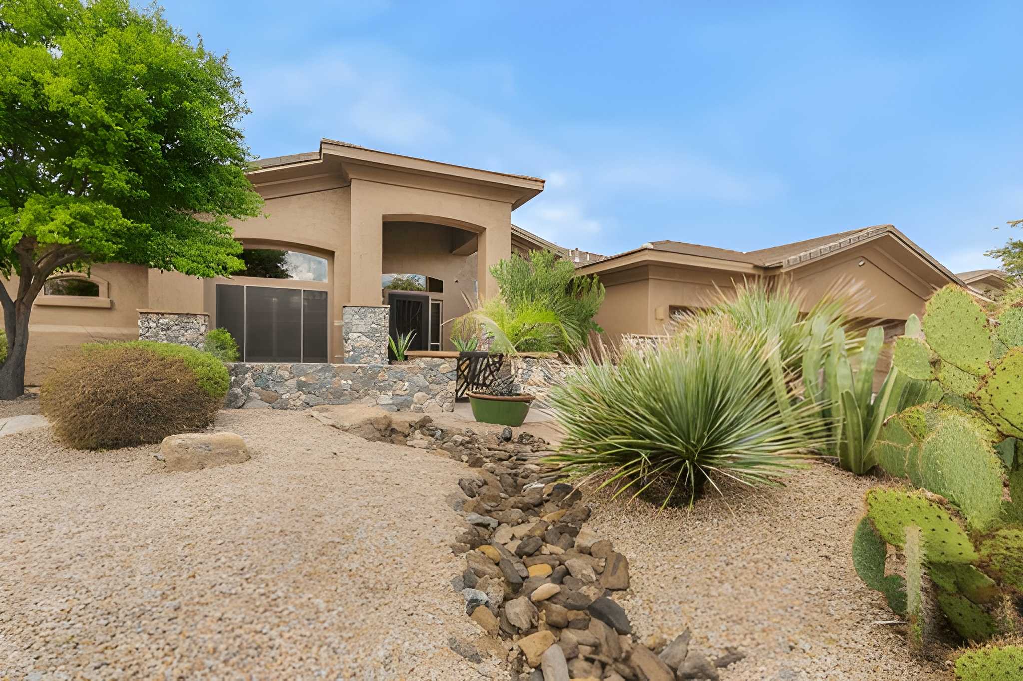 Low Maintenance Landscaping Las Vegas Ideas for the New Year-2 Sun Valley Landscaping's well-designed low maintenance desert landscape with a clean gravel yard and various desert plants in Las Vegas.