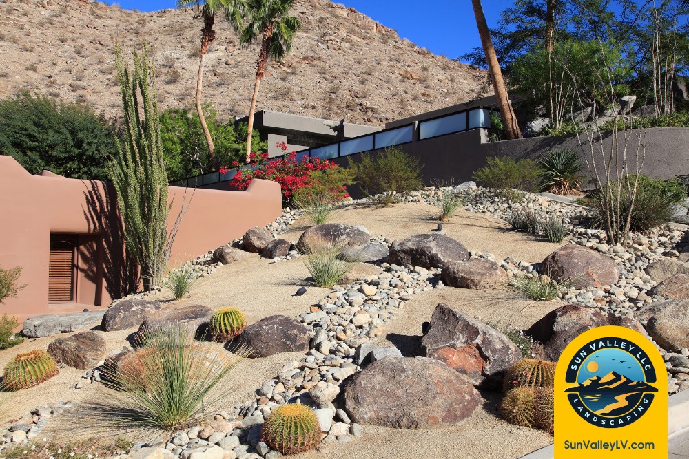 Creating a Low-Water, High-Impact Landscape for Las Vegas and Henderson Homes-1 Low water desert landscape with boulders and native plants by Sun Valley Landscaping for Las Vegas hillside homes