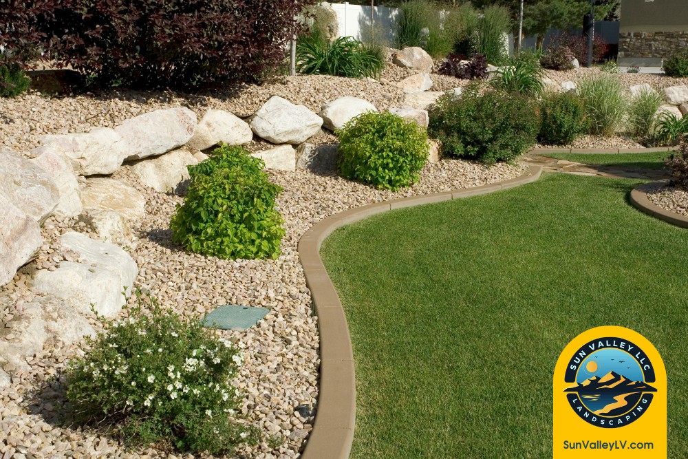 Creating a Low-Water, High-Impact Landscape for Las Vegas and Henderson Homes-3 Low water lawn with decorative rock edging and shrubs installed by Sun Valley Landscaping in Las Vegas and Henderson
